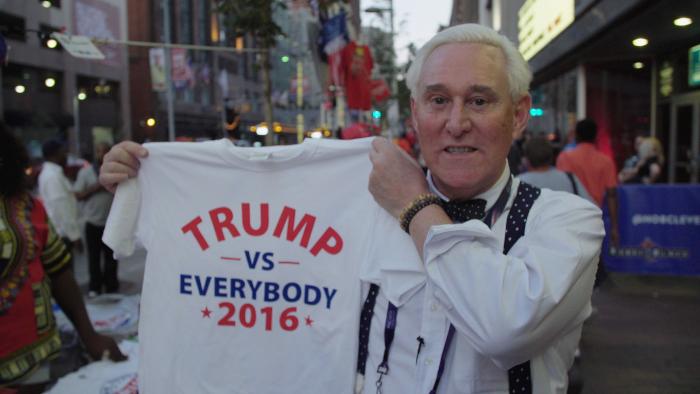 Roger-Stone-holding-Trump-t-shirt.jpg